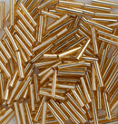 Toho Bugle Beads 9mm, 22B Silver-Lined Medium Topaz