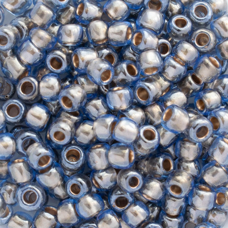 Toho Round Seed Beads Size 6/0 4mm, 992 Gold-Lined Light Montana Blue