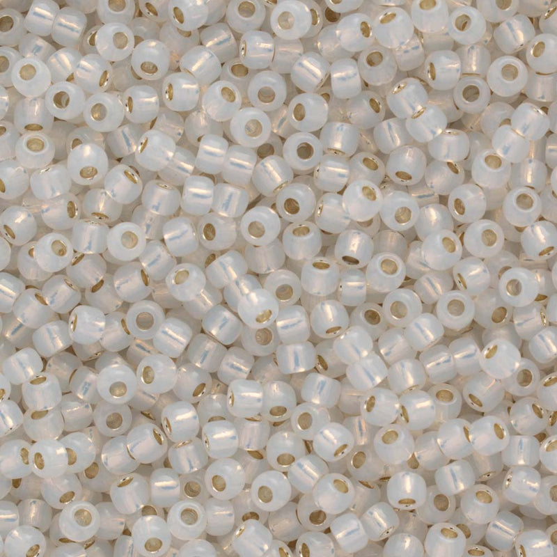 Toho Round Seed Beads Size 15/0 1.5mm, 2100 Silver-Lined Milky White