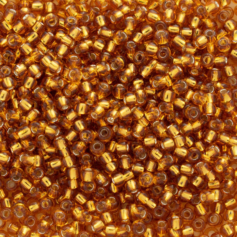 Toho Round Seed Beads Size 11/0 2.2mm, 22C Silver-Lined Topaz