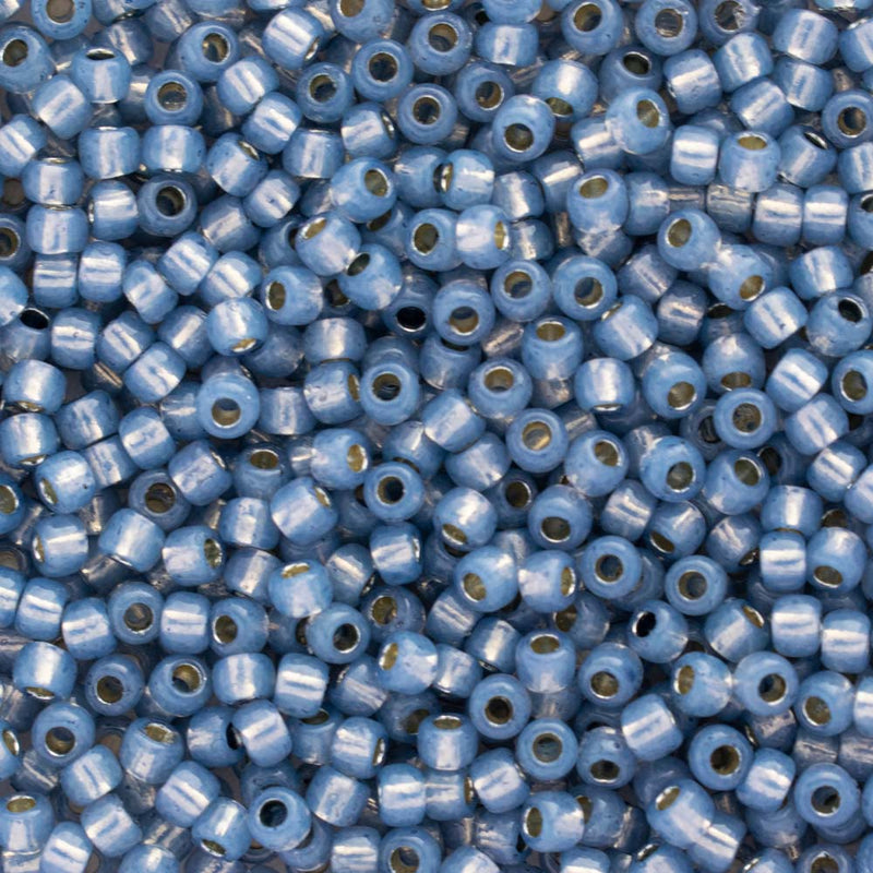 Toho Round Seed Beads Size 11/0 2.2mm, PF2102 PermaFinish - Silver-Lined Milky Montana Blue